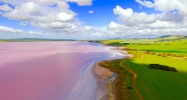 Insane drone photos of pink lakes, erupting volcanoes, and more