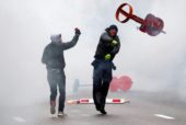 Violent clash outside EU HQ in protest over migrant pact