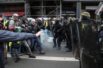 Gilets jaunes protesters take to the streets of Paris for fifth weekend